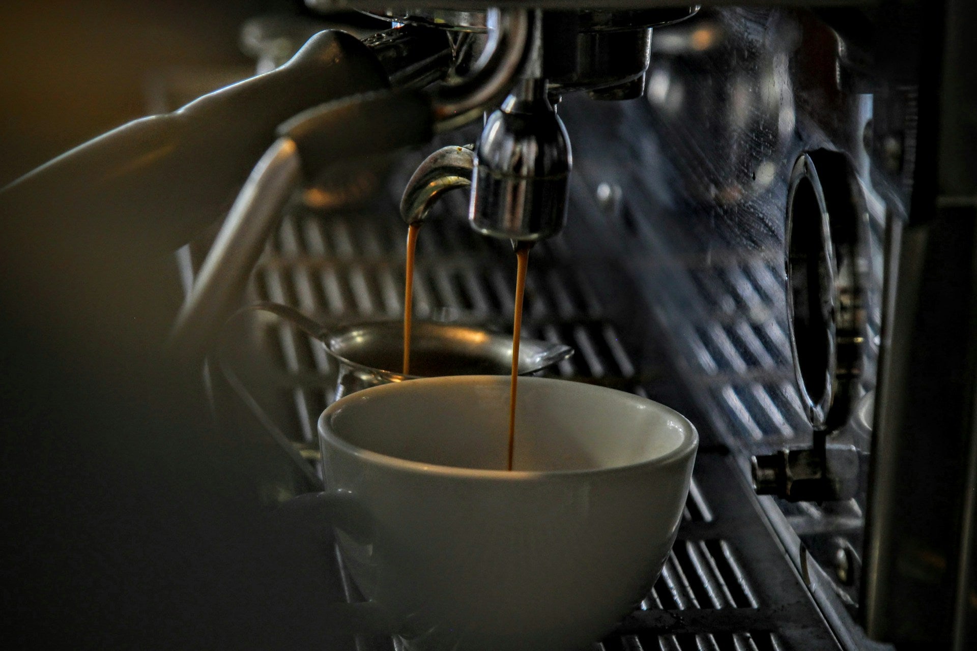 Espresso machine dispensing coffee